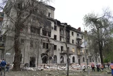 'Thank God I'm alive:' A Russian attack tore open this Ukrainian neighborhood, but residents quickly scrambled to pick up the pieces