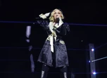 Fans sue Madonna over 2-hour delay to her show when they had to work the next day