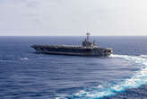 A US Navy aircraft carrier fresh off the Red Sea fight collided with a commercial ship near Egypt