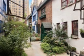This hidden street in New York City looks like the European countryside &mdash; and two condos on it are for sale