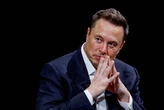 A group of Tesla investors is urging shareholders not to confirm Elon Musk's $1 trillion pay package