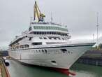 A residential cruise ship that's supposed to sail the world for 3 years has been stuck in Northern Ireland for 3 months