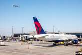 Two Delta planes collide on Atlanta airport taxiway, knocking the tail off one of the jets 