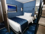Norwegian is vying for solo travelers with these tiny $1,880 single-person cabins on its latest giant cruise ship