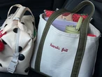 Women in the workplace are putting a new twist on L.L.Bean's famous tote bags