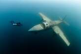 Award-winning underwater photos show haunting wrecks of warships and sunken planes