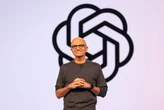 Microsoft CEO Satya Nadella says Bill Gates warned him that investing in OpenAI would be like setting $1 billion on fire