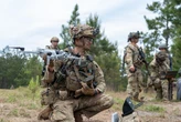 A US Army commander used attack drones and C4-packed robots to clear a deadly breach before soldiers even got in the fight