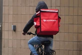 Good news, delivery drivers: DoorDash CEO says robotaxis aren't ready for food delivery