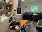 I spent almost $30,000 upgrading our garage to a dreamy laundry room. Now, doing laundry for my family of 7 feels peaceful.