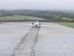 United Express captain did not follow co-pilot's calls before it overshot the runway, report found