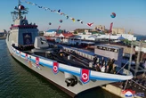 North Korea said its new 5000-ton destroyer was partially 'crushed' at launch due to a mishap as Kim Jong Un watched