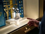 I bought a $14,000 Rolex watch to celebrate a career milestone. Some don't understand my lavish purchase, but it's a symbol of my success.