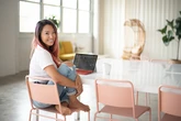 A millennial paid off six figures in debt and built a $1 million net worth. She explains how she invests her money.