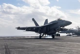 A US Navy aircraft carrier in the Red Sea fight just lost a third Super Hornet. The $60 million jet went overboard on landing.