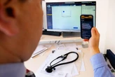 Cleveland Clinic's chief digital officer says its AI scribe is giving some doctors 'joy' again