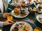 4 things you should never order in front of your boss or coworkers, according to an etiquette expert