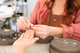 Prosecutors say the CFA Institute's former marketing chief embezzled millions and bought a $150k engagement ring