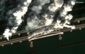 Satellite images show Russian forces throwing up smoke screens on a key Crimean bridge as Ukrainian drones target supply lines