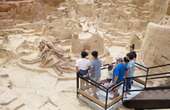 A sinkhole in South Dakota is packed with mammoth fossils that experts have been digging up for half a century. Take a look.