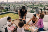 A family of 5 downsized from a Texas home to an NYC apartment. The kids share a room, but they've never been happier.