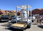 A giant Elon Musk bust was spotted at a Utah national park with a sign calling out DOGE cuts