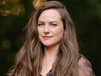 'Divine Rivals' author Rebecca Ross shares how she went from working a 9-to-5 to publishing one of BookTok's favorite series