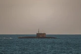 A Russian submarine's 'unusual' behavior has NATO's attention. A top official says it's 'limping home.'