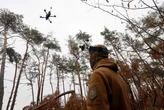 Russia said Ukrainians used balloons, trailers, and drones to sneak AI attack quadcopters deep into its country