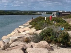 I live in Rhode Island. My favorite town to visit in the summer has great seafood, quiet beaches, and a bamboo forest.