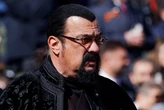 Steven Seagal appeared at Putin's big Victory Day celebration next to a biker gang