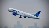 Passenger injured by falling suitcase sues United, saying cabin crew should've helped put luggage in overhead bin