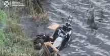 Video shows Ukrainian drone taking out a jet ski with 2 Russian soldiers who were attempting to cross the Dnipro River