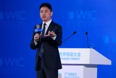 The founder of China's Amazon wants his 700,000 blue-collar workers to be 'white-collarized' in time for AI