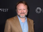 Netflix's Ted Sarandos called seeing movies in theaters 'outdated.' Rian Johnson wants his next 'Knives Out' movie in as many as possible.