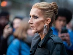 Céline Dion says that almost anything &mdash; even happiness &mdash; can trigger the symptoms of her stiff-person syndrome