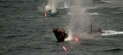 New military photo captures a NATO warship taking out an explosive-packed drone boat during a Red Sea rescue mission