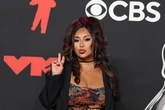 Nicole 'Snooki' Polizzi now goes to bed at 7 p.m. and tells her kids that she was acting on 'Jersey Shore'