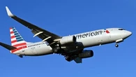 American Airlines Traveler Restrained With Duct Tape After Trying To Open Emergency Exit Door Mid-Flight