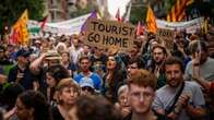 Barcelona Visitors Sprayed By Water Guns As Residents Protest Glut Of Tourism