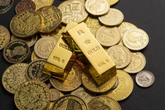 Oro ai minimi con tassi Bce al rialzo. Ma target JPMorgan e BofA a $5.000-$6.000