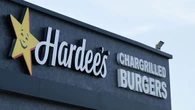 Hardee’s franchisee Paradigm sues over termination threats and tech fees