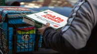 Papa Johns box message telling customers to tip delivery drivers sparks fierce tipping culture debate online