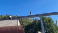 Dramatic video shows boy balancing 100-ft above panicked crowd at Hersheypark