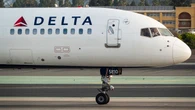 Delta flight diverted after battery fire fills cabin with smoke