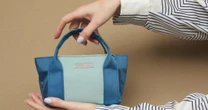 廃棄される漁網や海洋プラスチック…「海の厄介者」を使った高級スマホポーチをプレゼント