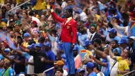 Why does this World Cup superfan stand like a statue every game