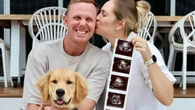 Aussie Olympic hero shares baby joy with husband-coach