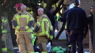 Woman dies after being pulled from Sydney unit fire