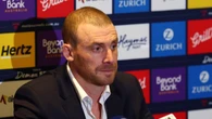 Simon Goodwin’s parting ‘backhander’ cuts Melbourne deep